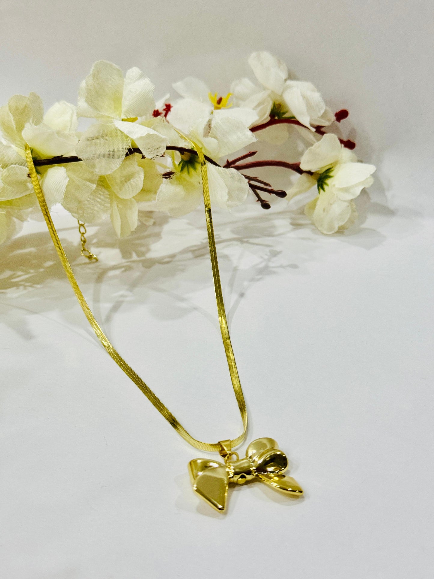 Golden Bow Pendant Necklace