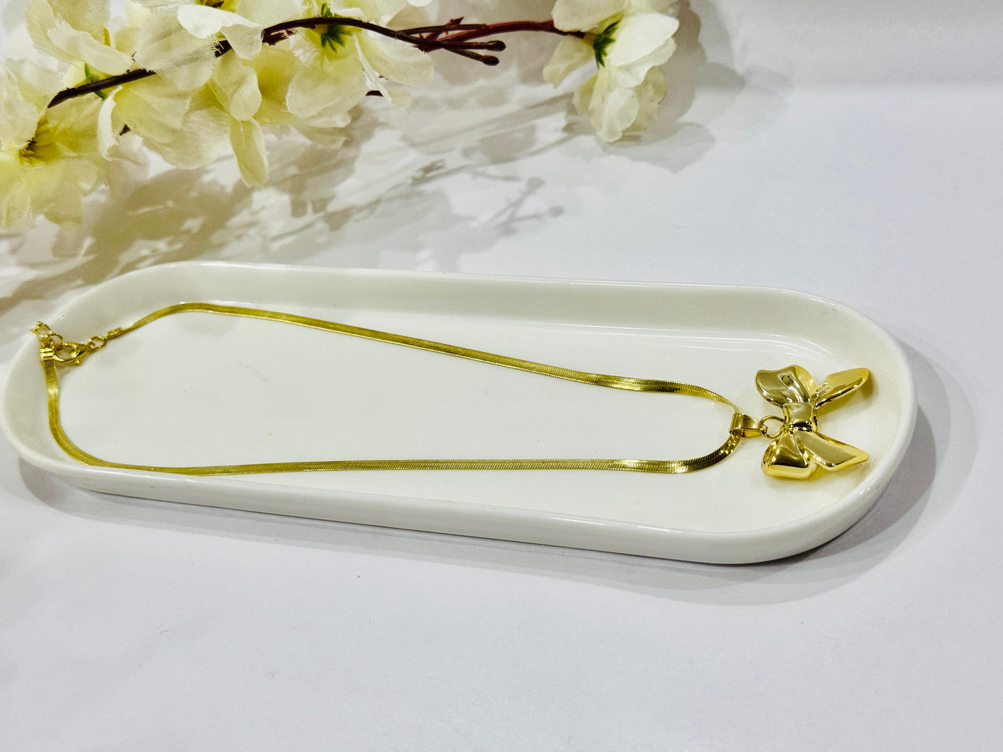 Golden Bow Pendant Necklace