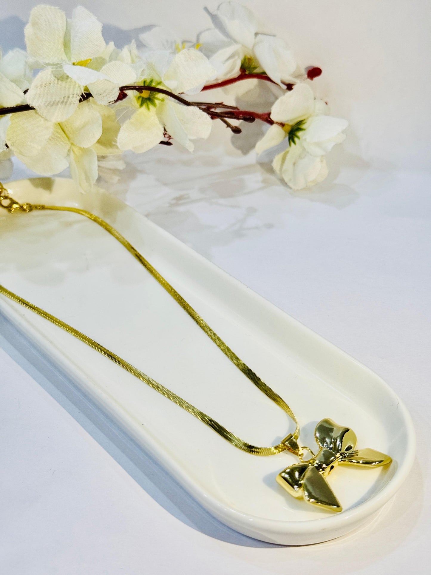 Golden Bow Pendant Necklace